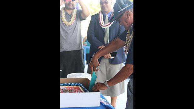 Stadium director Tole’afoa Henry Tavake cutting the cake