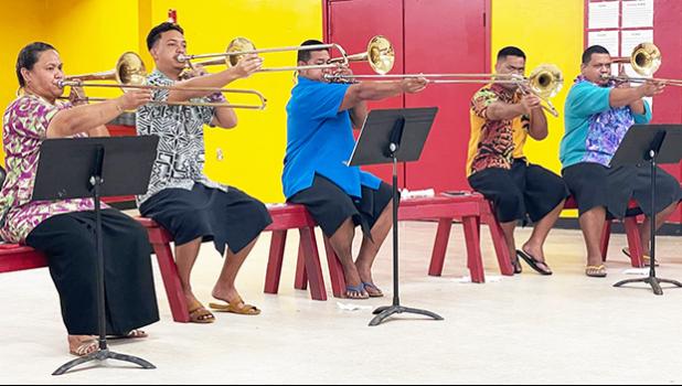 5 young trombone players