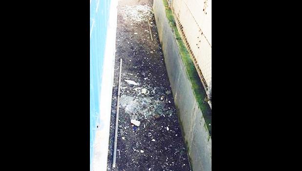 Broken glass at baseball field [Photo: Courtesy]