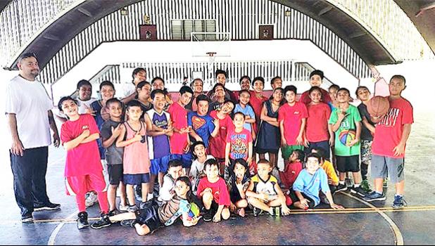 Pictured are some of the kids who came out on Saturday, with Coach Michael Pereira (standing far left)  [photo: Mark Espiritu]