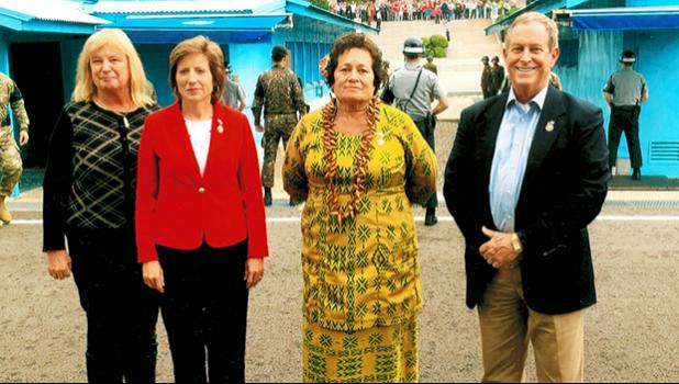 Amata with  members of the House Armed Services Committee