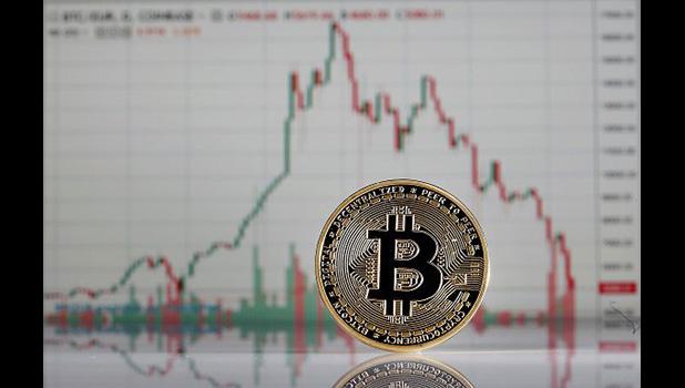 Bitcoin displayed in front of a price chart on the website of cryptocurrency exchange Coinbase earlier this year.