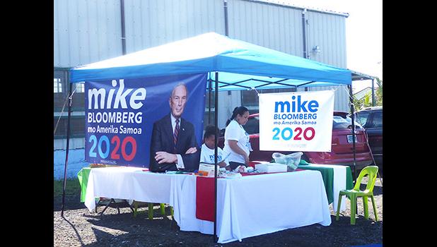 Local supporters for US democratic presidential hopeful, billionaire businessman Mike Bloomberg at their campaign booth.