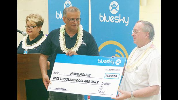 In the presence of the residents that were able to take part including the staff, management and Hope House board members, the Bluesky team presents their donation
