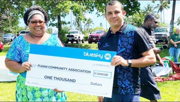 Bluesky presents $1,000 check