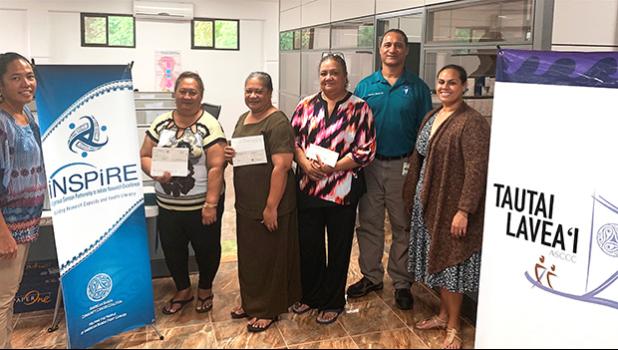 (l-r) ASCCC treasurer Christinna Lutu-Sanchez, Akenese Maifea, Faaeteete Sio, Meleseini Siufanua, ASCCC chairman Taotasi Archie Soliai, and board member Dr. Jueta McCutchan. (Not pictured is Lumana'i Maifea).