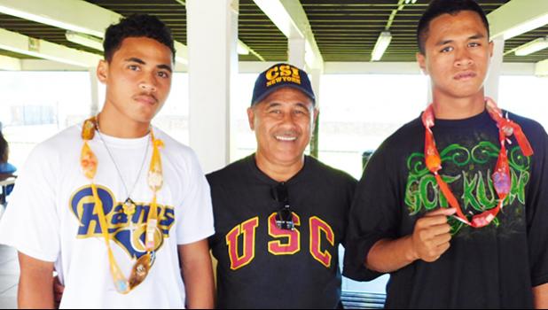 SUCCESS ALL AROUND: The two boxers, (far right) Falaniko Tauta and (far left) Jeffrey Tago  — who represented American Samoa for two weeks in Canberra, Australia during the International Training Competition. Tauta qualified for the 2018 Youth Olympic Games in Argentina, Tago will compete in this year’s Pacific Mini Games, while (center) Vice President of the American Samoa Amateur Boxing Association, Okesene Malala earned his 1-star Coach certificate to coach and referee at the YOG 2018. [photo: EM]
