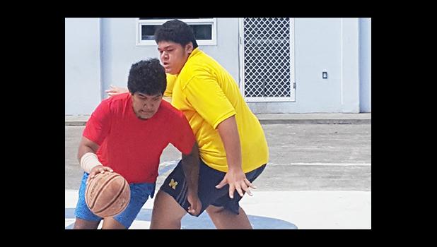 It was all about good ball handling and defense last Saturday during the final day of Manumalo Church's first annual Basketball Fellowship League. [Courtesy photo]