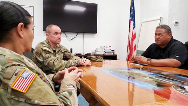 rig. Gen. Timothy Connelly and Command Sgt. Maj. Jessie Baird with Timothy Faumuina