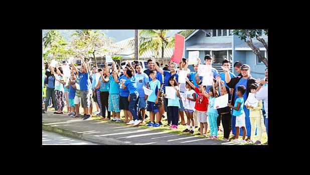 Faculty and staff of South Pacific Academy wore blue and along with all of their students joined the global awareness to stomp out bullying on Monday morning.  [Photo: JL]