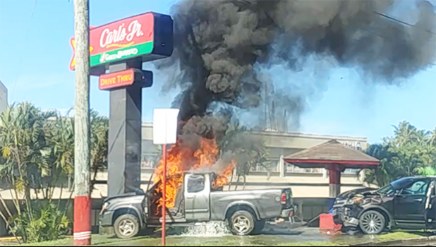 Truck on fire in front of Laufou Shopping Center