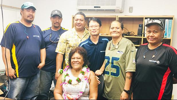 Can plant employees bid farewell to longtime employee Tapaau Fleming (seated) 