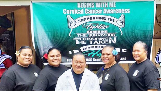 Cervical Cancer Awareness Month banner with LBJ staff standing in front