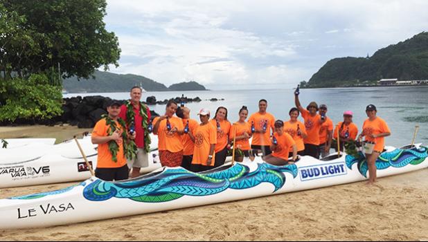 A representative of SoPac Distributors (Bud Light), who sponsored one of the canoes, for the Le Vasa Club celebrating the blessing of the new outrigger canoes on Tuesday afternoon at the Sadie’s by the Sea beach in Utulei. [photo: Ese Malala]