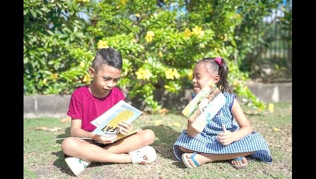 two children with books