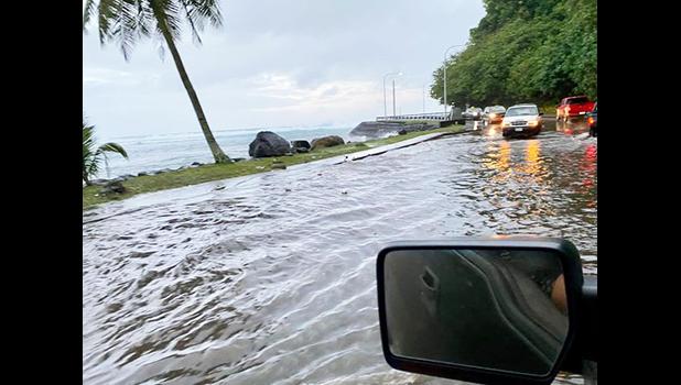 “Although king tides ended yesterday (Wednesday) around 1 PM, large southerly swells continues to impact our shores.: flooded coastal road