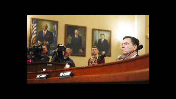 FBI Director James Comey testifies on Capitol Hill in Washington, Monday, March 20, 2017, before the House Intelligence Committee hearing on allegations of Russian interference in the 2016 U.S. presidential election. (AP Photo/Manuel Balce Ceneta) FBI Director James Comey testifies on Capitol Hill in Washington, Monday, March 20, 2017, before the House Intelligence Committee hearing on allegations of Russian interference in the 2016 U.S. presidential election. (AP Photo/Manuel Balce Ceneta)