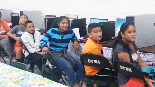 Forty-two youngsters from around the territory are using their summer months learning how to become web savvy, thanks to the free computer basic research course being administered by the Dept. of Youth and Women's Affairs. See story for full details. [photo: Blue Chen-Fruean]