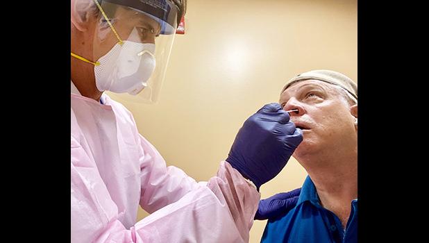 Samoa News photographer Barry Markowitz getting tested for Covid 19 