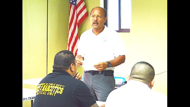 Ernest Haleck, a certified Firearms and Tactics Instructor from Honolulu, during yesterday's official opening of a training session held at the OMV conference room and aimed at preparing local cops to be armed. [photo: AF]