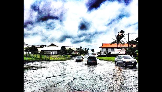 Flooding in front of Cost U Less