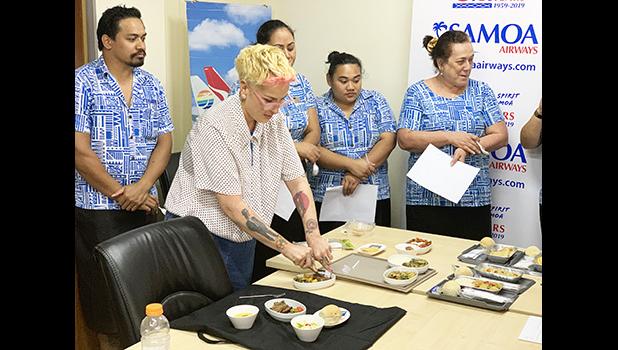 Samoa Airways staff members seeing samples of the airline’s new “farm to plane” menu