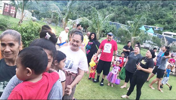 The large crowd lining up for fun and games at the Halloween Harvest Carnival hosted by Maoputasi Rep. Vesiai  Poyer Samuelu and  family.