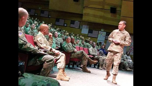 Retired Command Sergeant Major Charles Tobin (standing, right) 