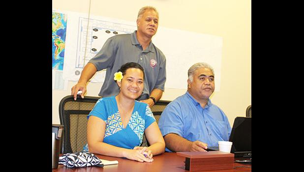  National Weather Service Office meteorologist Elinor Lutu-McMoore with local Department of Homeland Security officials Fale Ulufale and Vinnie Atofau.  [photo: FS]