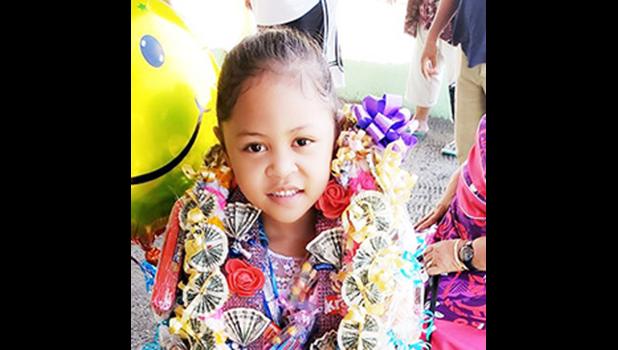 Daenerys Vitolio after her K-5 graduation