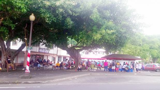 Hundreds of local residents gathered at the DHSS compound 