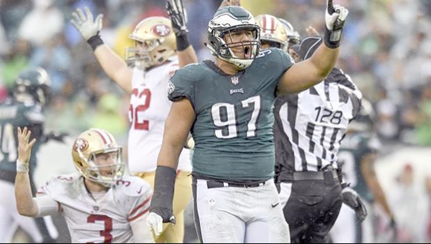 Eagles defensive tackle Destiny Vaeao celebrates his sack of San Francisco 49ers quarterback C.J. Beathard (lower left) during the game at Lincoln Financial Field October 29, 2017. Eagles won 33-10. [CLEM MURRAY / Staff Photographer]