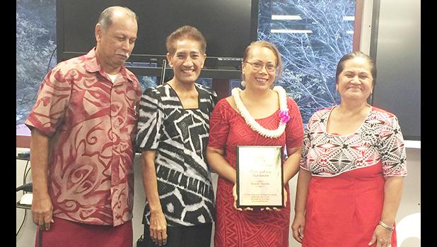 Tafuna High School principal Tutuila Togilau (second from right), Philo Jennings (far left) and Faaui Vaitautolu (second from left).