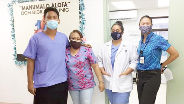Dr. Francine Amoa (far right) with DoH staff, 