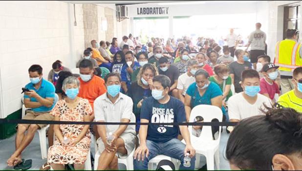 A crowd with masks at DoH