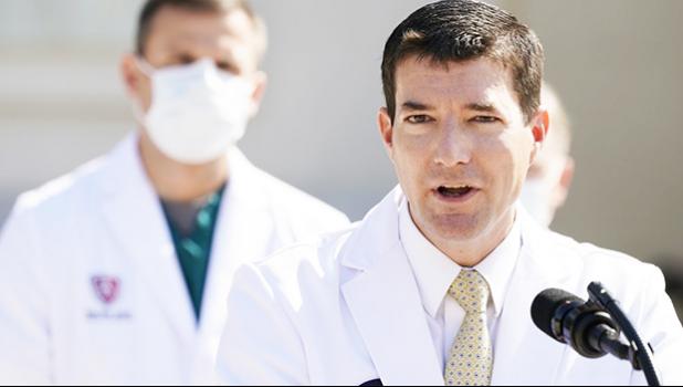 Dr. Sean Conley, physician to President Donald Trump, briefs reporters at Walter Reed National Military Medical Center in Bethesda, Md., Sunday, Oct. 4, 2020. Trump was admitted to the hospital after contracting the coronavirus. (AP Photo/Jacquelyn Martin) Dr. Sean Conley, physician to President Donald Trump, briefs reporters
