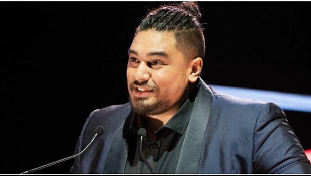  A slightly teary-eyed Kings accepting his second award of the night - Best Pacific Urban Artist. [Photo: Hannah Rolfe / Topic via RNZI] 