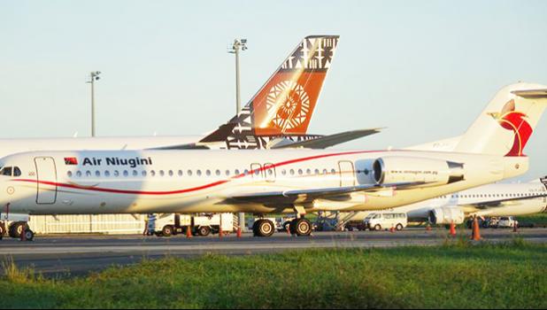  Air Niugini and Fiji Airways parked at Nadi International Airport 