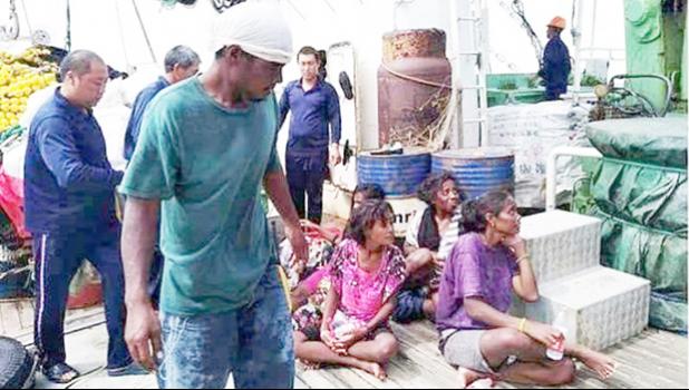  Some of the seven survivors shortly after being rescued [Photo: Facebook/ @RadioKiribati]