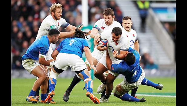 Ellis Genge tries to find a route through for England under heavy pressure from the blue-shirted Samoans [Reuters via Daily Mail]