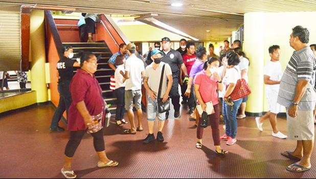 Crowds of people inside the EOB