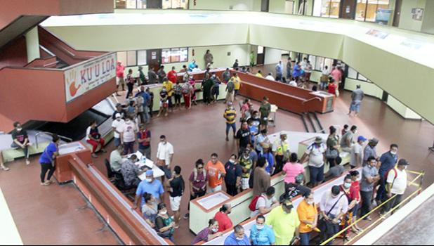 A view of the atrium at the EOB crowded with people