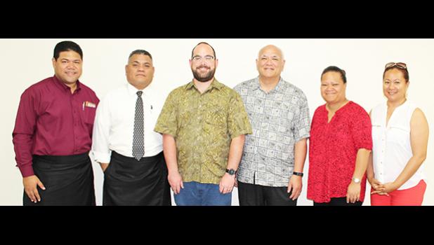 DOH officials, including Dr. Glenn Gabbard (center in green)