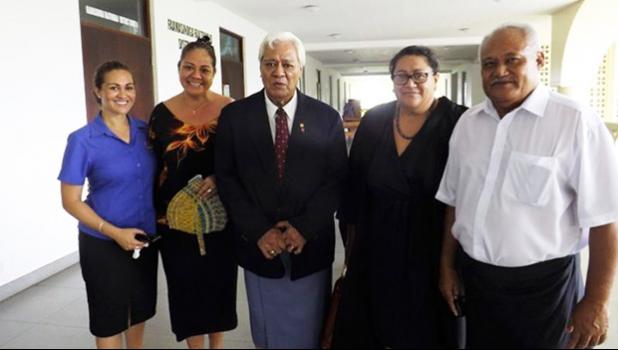 Faamauslil Moli Malietoa [centre) Photo: RNZI/Autagavaia Tipi Autagavaia Faamauslil Moli Malietoa leaving courthouse surrounded by family members
