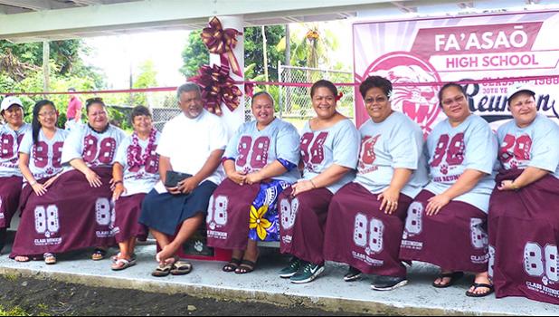 Father Kelemete Puaauli (middle wearing white shirt), surrounded by some of the graduates from Fa’asao High School Class of 1988
