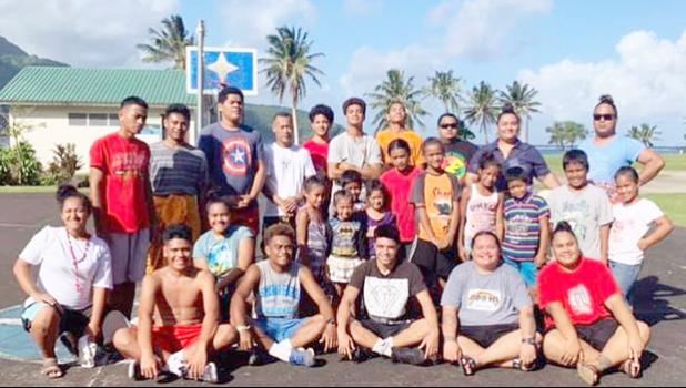 Young people of Fagaalu village in a group photo
