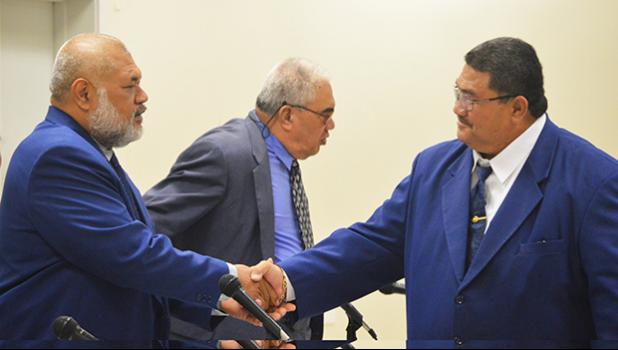 Fetu Fetui Jr shaking hands with Rep. Sataua Dr. Mataese Samuelu 