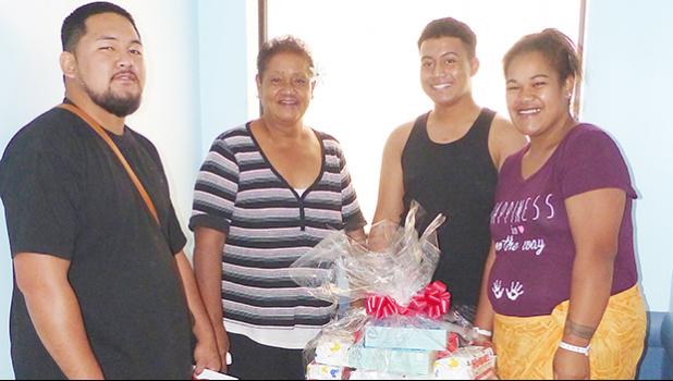 Family of New Years baby with gift packages