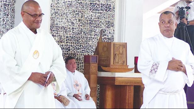 Father Salesi Moimoi (left) and Father Andy Wilson (right)
