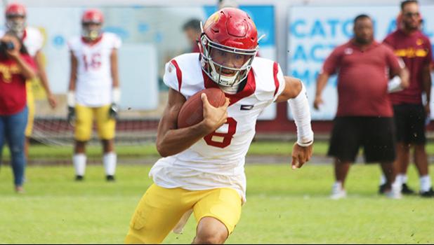 Tafuna Warriors quarterback Oakland Salave’a scrambling